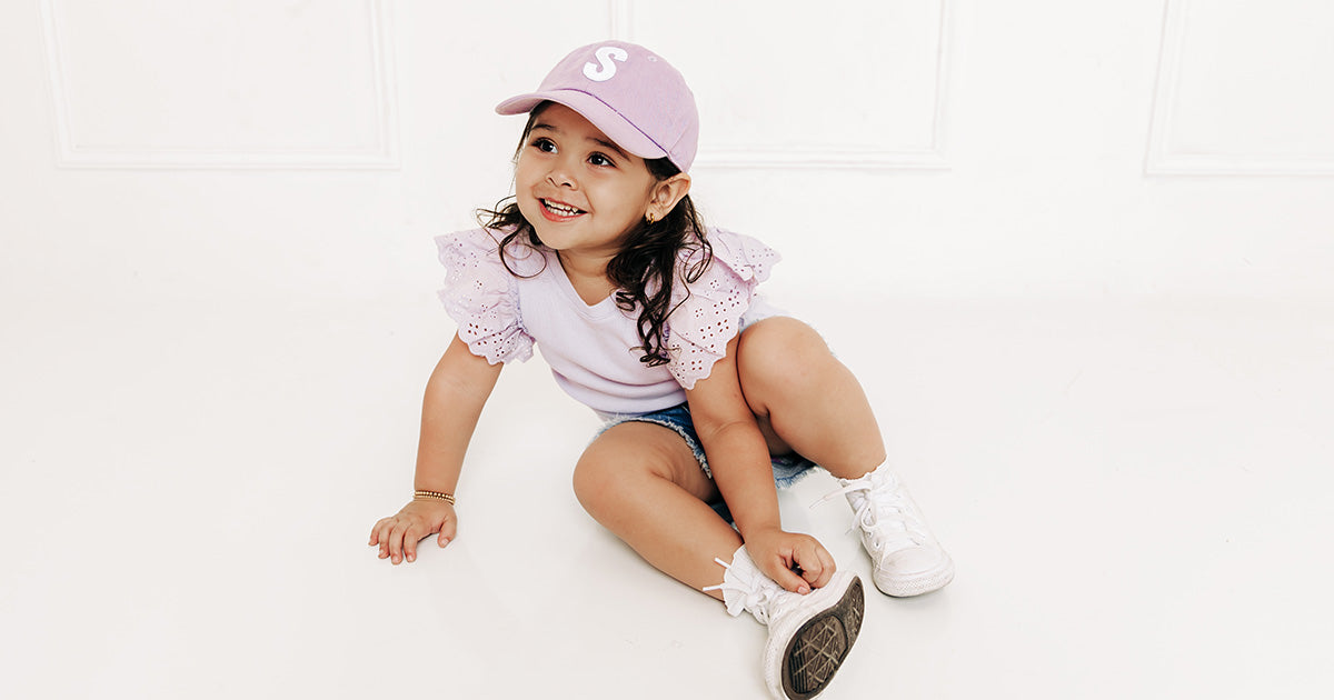 Spring into Fun: 10 Ways to Welcome Spring as a Fam. (Look the Part in Cute Baseball Hats!)