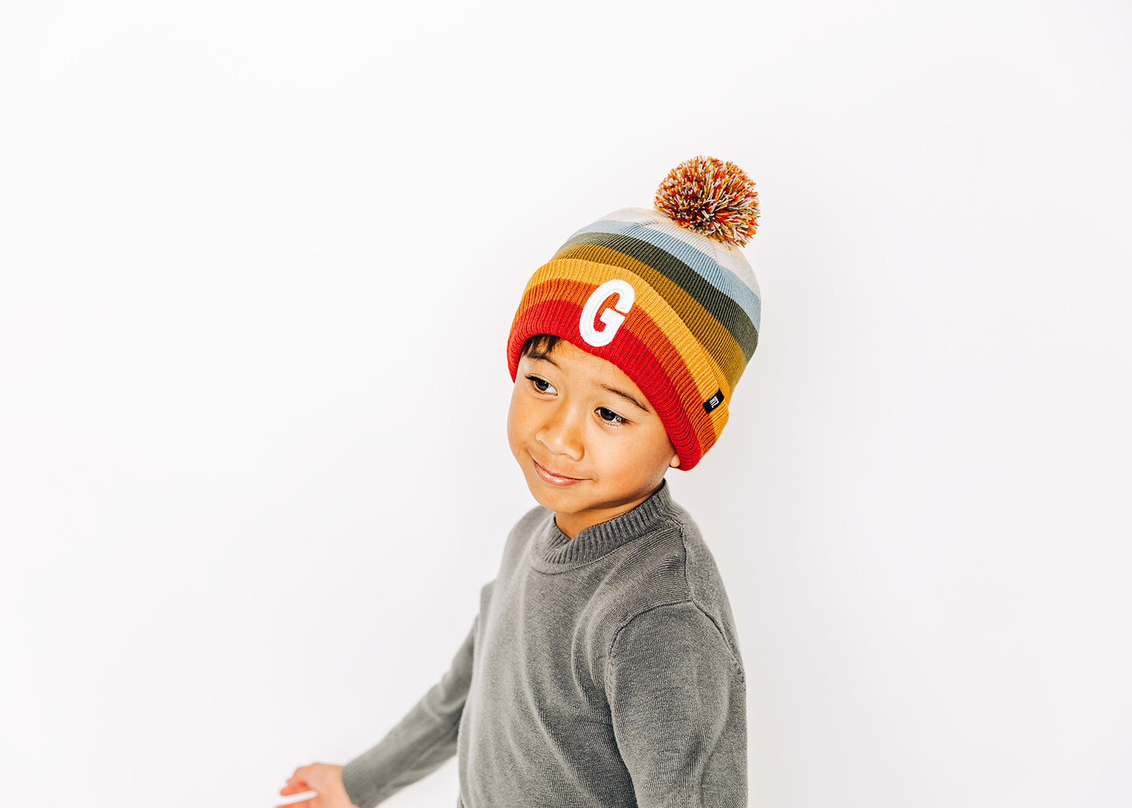 Sedona Stripe Letter Pom Pom Hat