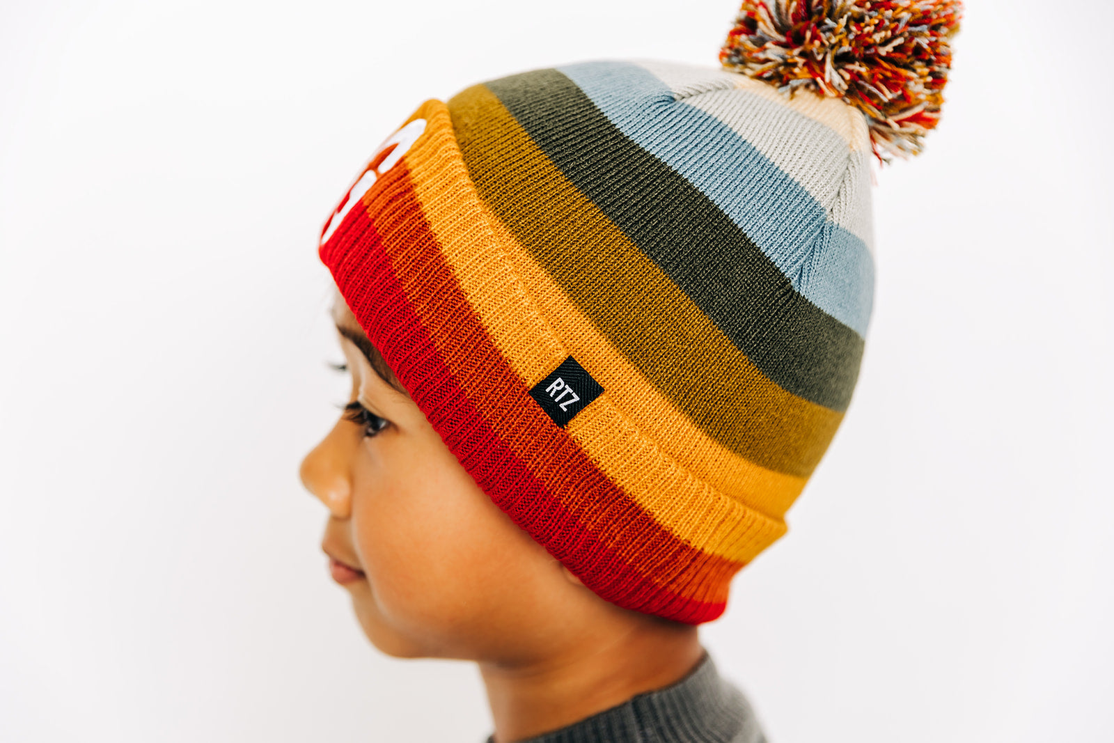 Sedona Stripe Letter Pom Pom Hat