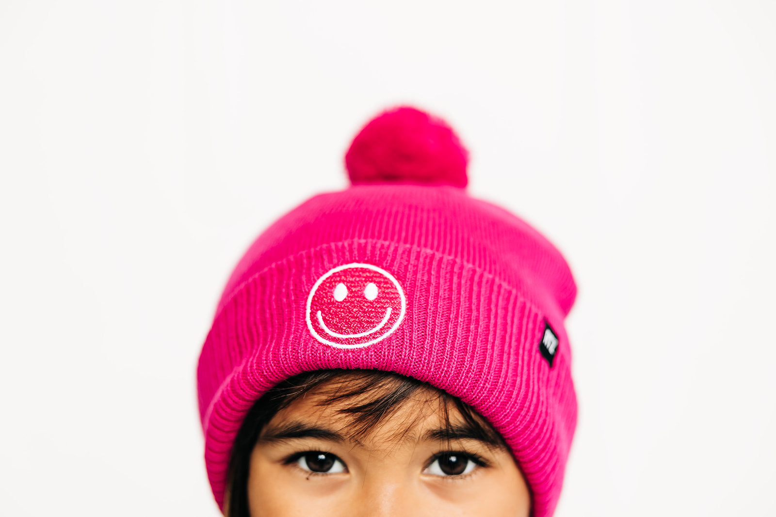 Smiley Pom Pom Hat
