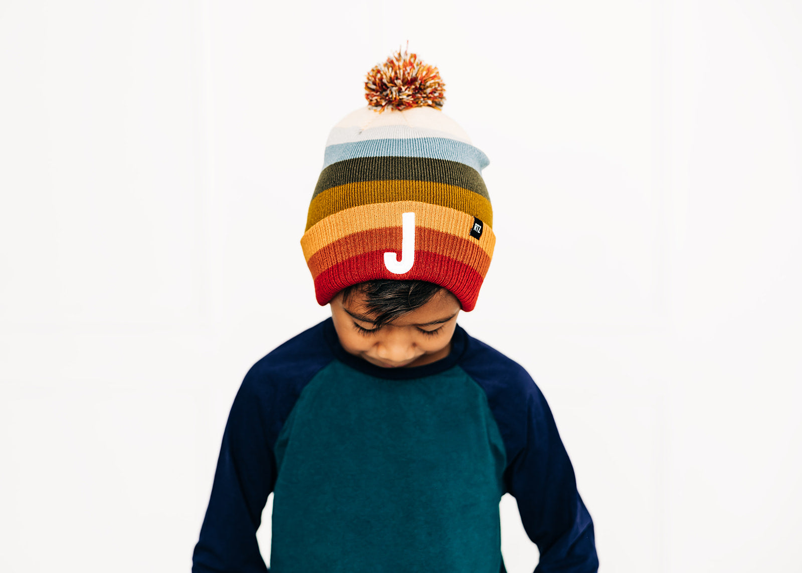 Sedona Stripe Letter Pom Pom Hat