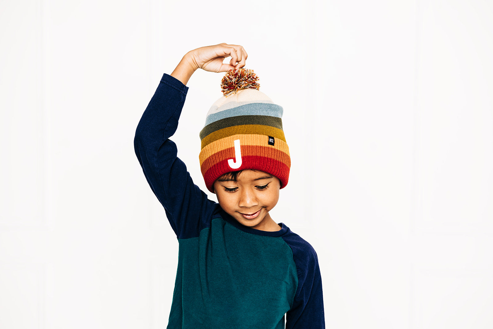 Sedona Stripe Letter Pom Pom Hat