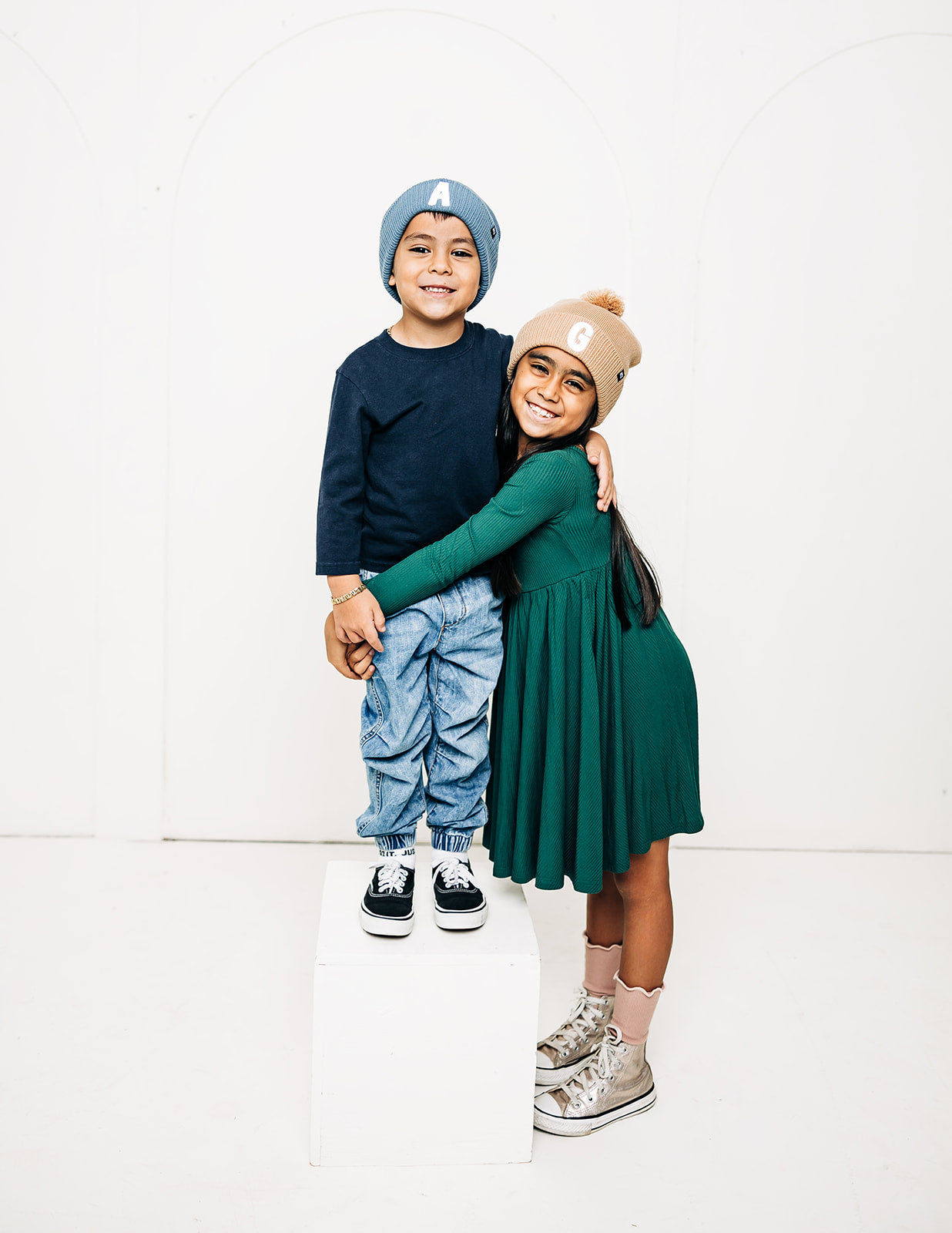 Tan Letter Pom Pom Hat