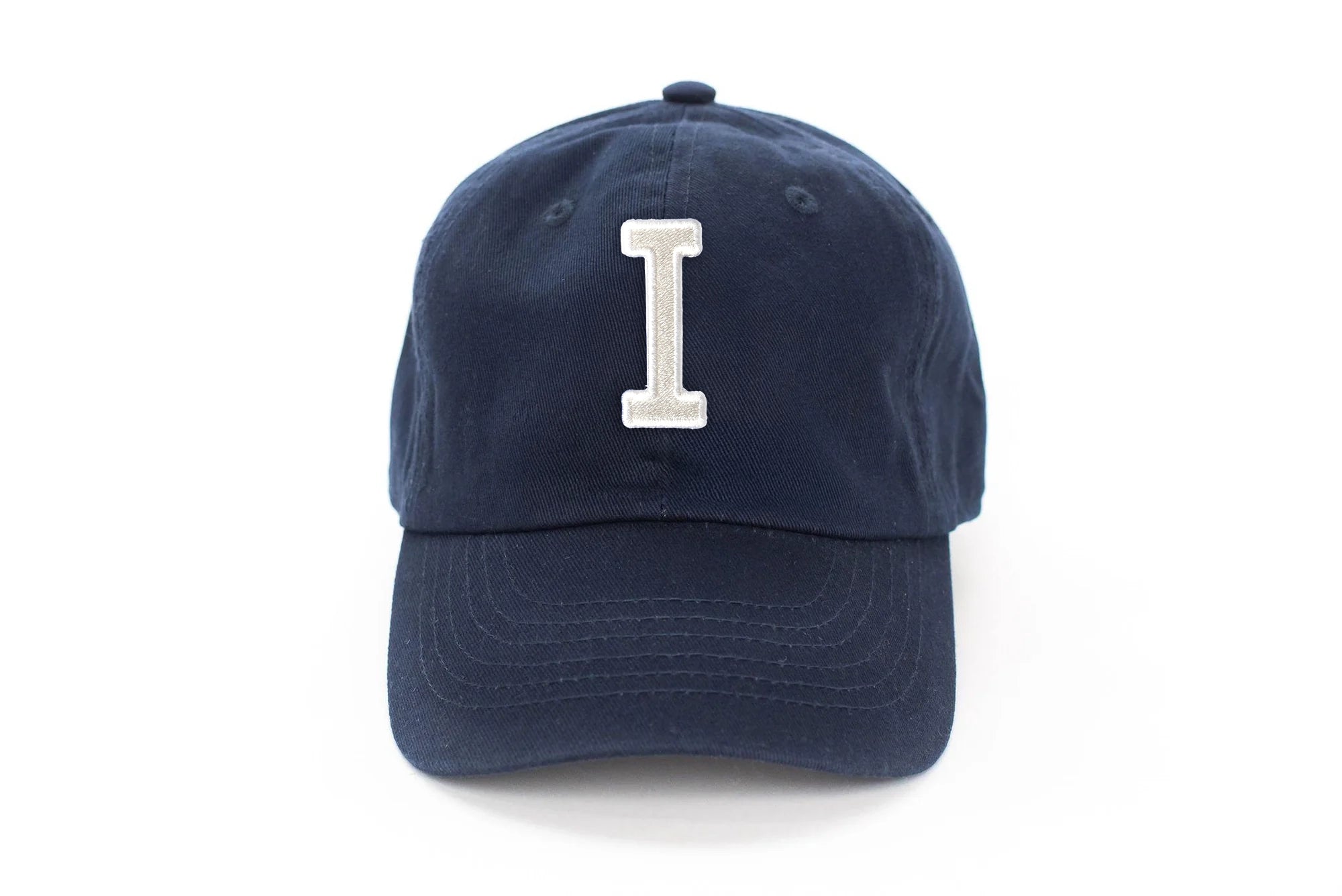 Blue United States US Navy Letters on Bill Emblem Embroidered Hat Cap (Officially Licensed by The US Navy) at Men's Clothing store Blue United States US Navy Letters on Bill Emblem Embroidered Hat Cap (Officially Licensed by The US Navy) at Men's Clothing store