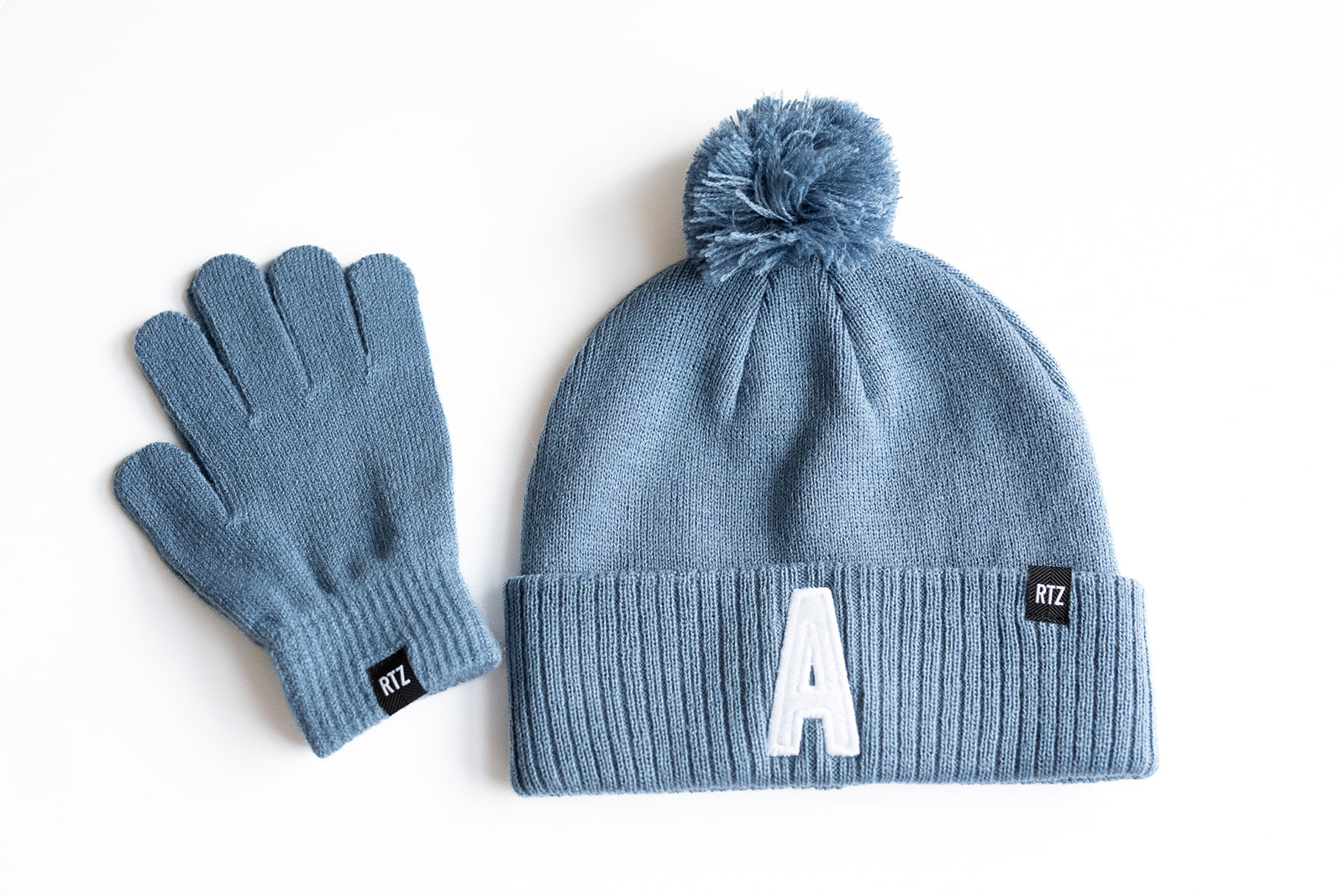 Blue Letter Pom Pom Hat