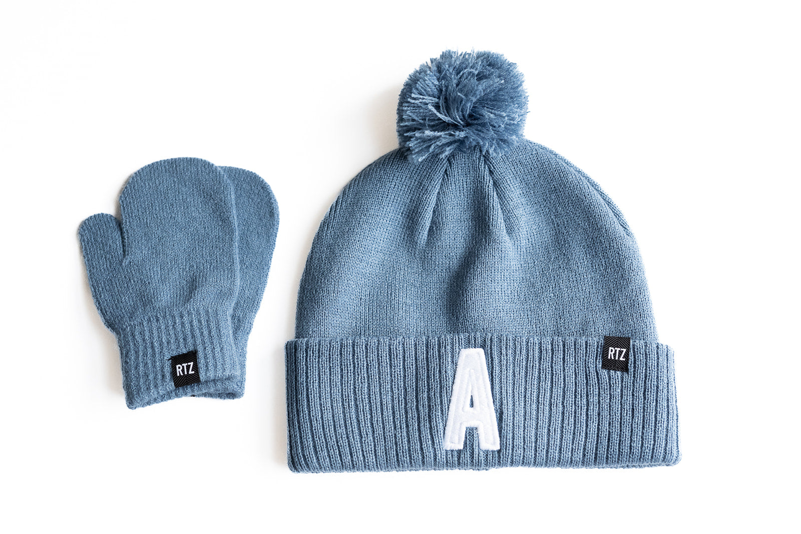 Blue Letter Pom Pom Hat